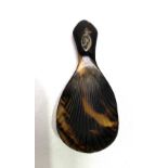 A George III tortoiseshell caddy spoon with shell bowl, inlaid silver cartouche monogrammed 'D',
