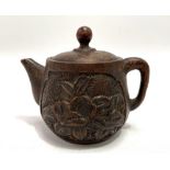 A Chinese miniature carved bamboo teapot, height 7cm.