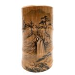 A Chinese bamboo brush pot painted with a mountainous landscape with waterfall, calligraphy