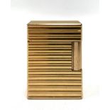 A Dupont Paris gold plated lighter, No.16 JAL22, length 4.5cm.