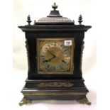 Oak cased three train bracket clock, the brass 5.5in square dial with silvered chaptering and signed