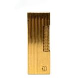 A gold plated Dunhill lighter No.10788, length 6.5cm.