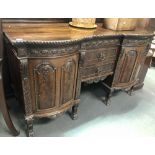Matching mahogany sideboard to Lot 944 with an arrangement of two central drawers flanked by two