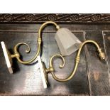 Pair of brass scroll wall lights.