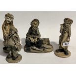 Four Norman Underhill Pottery figures.