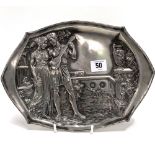 A continental Art Nouveau pewter tray cast in relief with two classical lovers in a garden