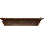 Late 19th Century oak carved shelf, width 112cm.