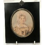 A cased miniature of a Victorian lady, 8.9 x 7.4cm