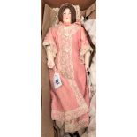 Early 20th Century porcelain composition doll with porcelain limbs & soft body, height 45cm approx