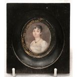 A cased miniature of a Georgian lady, 4.9 x 4cm