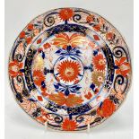 A 19th century Imari decorated Mason's patent ironstone china plate, stamped mark to the back,