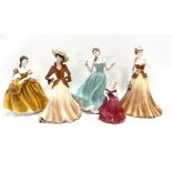 Five porcelain Coalport lady figures.