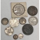 Coins to include an 1890 American one dollar, 1910 & 1915 half crowns, Victoria 1853 penny with