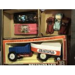 Diecast toys including a boxed Britains blue Ford tractor and rear dump set no. 9630, two Dinky toys