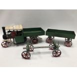 A vintage Mamod steam wagon, length 39cm; together with a Mamod cart & open log wagon