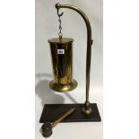Early 20th Century brass dinner gong made from a shell cartridge and on brown Bakelite base with