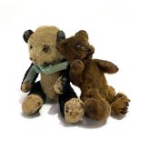 Two small vintage mohair teddy bears, one brown, the other black and white, height of largest 14.5cm
