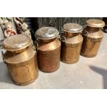 Four copper painted and copper lid ten gallon milk churns, one with lid for E Dairy (C) Ltd Hayle.