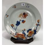 An 18th century Chinese export Imari dish, the centre decorated with two crabs amongst foliage,