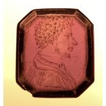 Two 18th or early 19th Century glass intaglio Tassie 'gems', one of rectangular canted form engraved