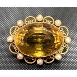 Victorian gold citrine and seed pearl set oval brooch, width 28mm approx, weight 8.2g approx.