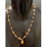 Yellow metal amber bead necklace, length 47cm