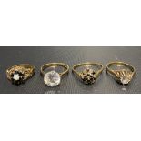 Four 9ct gold stone set rings, weight 8.2g approx.