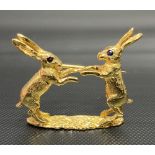 Harriet Glen 9ct hallmarked gold brooch in the form of a pair of boxing hares with small blue