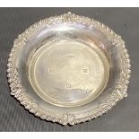 Modern silver circular card tray with gadrrooned and foliate embossed rim, maker AM & Co, Birmingham