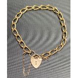 9ct gold curb link bracelet with padlock clasp, weight 10.5g approx.
