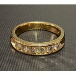 14ct gold diamond set six stone ring, the diamonds of 0.20ct spread approx, stamped 14K, weight 9.5g