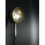 19th Century white metal toddy ladle with twisted baleen handle, length 30.5cm