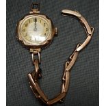 Early 20th Century 9ct gold ladies manual wind wristwatch, the 20mm silvered textured dial with