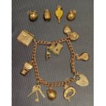 9ct gold charm bracelet with thirteen 9ct gold charms, weight 24.3g approx.