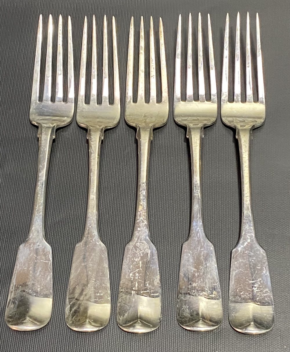 George III Irish silver set of five fiddle pattern table forks by Samuel Neville, Dublin 1815,