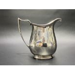 George V silver cream jug by Mappin & Webb, London 1931, height 9cm, weight 3.95oz approx.