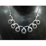 A Danish sterling silver paste set necklace by Hermann Siersbol, stamped 'STERLING DENMARK HS'.