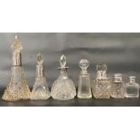 Seven various silver scent bottles, two with screw lids, the other with mounts (all AF)