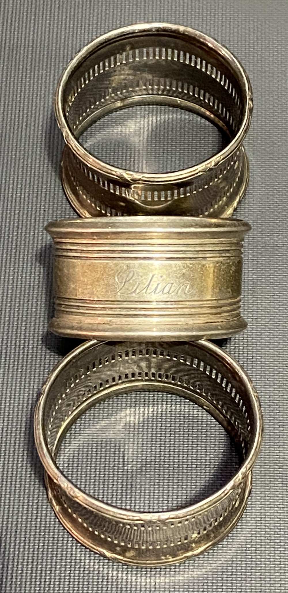 Pair of silver pierced napkin rings; together with one other napkin ring (3), weight 1.95oz approx. - Image 2 of 2