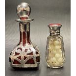 George V silver lidded scent bottle with glass facet cut body, the screw lid with red guilloche