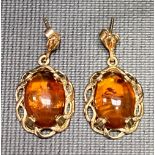 Pair of 9ct gold mounted amber drop earrings, weight 4.5g approx.