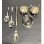Pair of small Victorian silver circular salts with shaped rims and on triple ball feet, maker JNL,