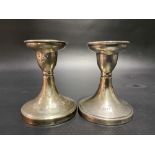 Pair of silver squat candlesticks with engraved dedication, maker S.B & S.L.LD, Birmingham 1931,