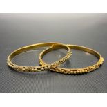 Two Eastern high purity gold bangles, weight 37.7g approx.