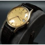 Omega 9ct gold gent's automatic wristwatch, the gilt 28mm dial with gilt baton hour markers and