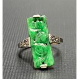 9ct green jade set ring, the setting inset with two small diamonds, weight 3.1g approx.