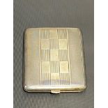 Sterling silver engine turned cigarette case, stamped STERLING SILVER, width 9.5cm, weight 3.50oz