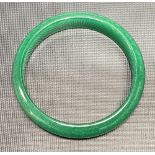 Chinese spinach green jadeite bangle, diameter 7cm; together with a Celadon jade cylindrical finial,