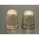 Two silver thimbles, one by Charles Horner and inscribed DORCAS