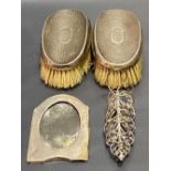 Pair of silver hallmarked planished hair brushes, Birmingham 1912; together with an Eastern white